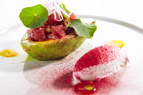 istock Tuna Tartar Made from Raw Fish Served in Avocado 1184529743