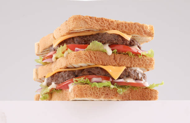 istock toast bread burger with cheddar cheese and vegetables 1184534606