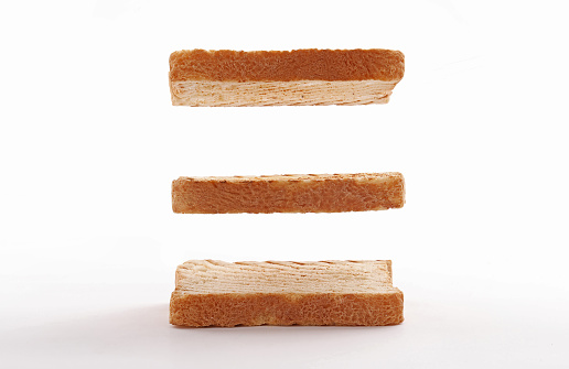 toast bread float, fly with grill marks on white background