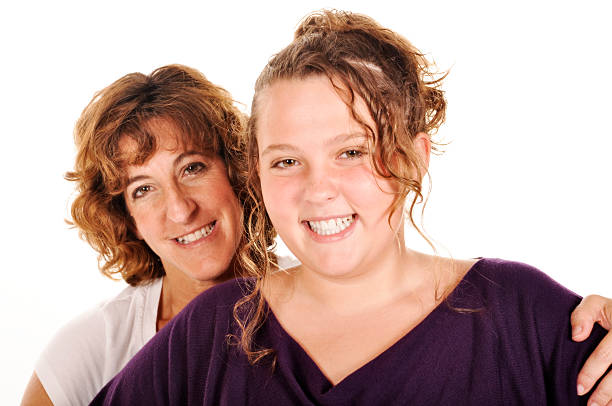 Portrait Caucasian Teenage Girl and her Mother Isloated on White  islotaed on white stock pictures, royalty-free photos & images