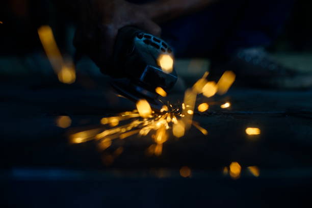istock Bright blue and yellow sparks on a black background. Magical lig 1184541839
