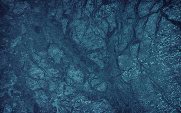 istock Background - grain texture blue paint wall. Beautiful abstract grunge decorative navy blue dark wallpaper. 1184545544