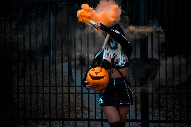 istock Girl with pumpkin 1184553372