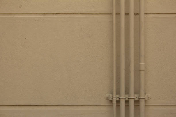 View of the Piping system installed in the exterior concrete wall , water transport system in the building