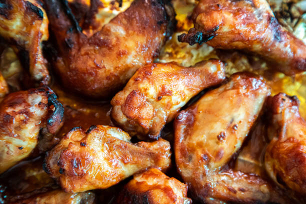 istock Close up image Grilled chicken wings and legs on  table, Top view. 1184556341