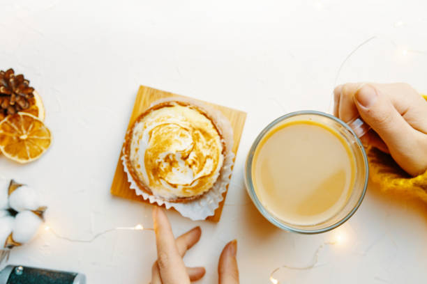istock Coffee and cake with cream on the table. 1184557257
