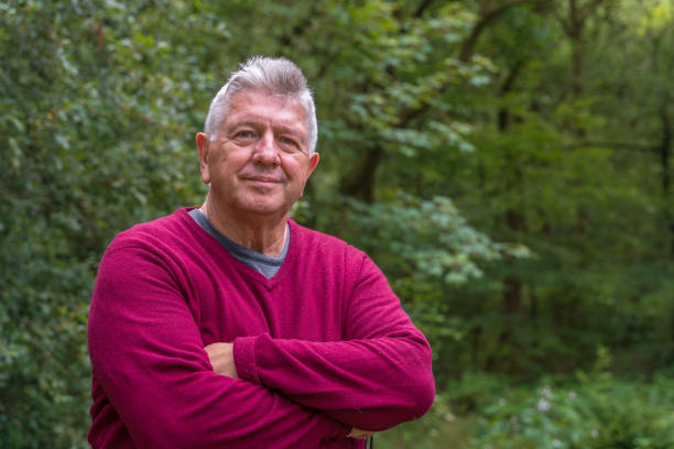 istock Active senior man in countryside portrait 1184560386