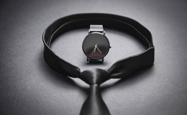 tie with a wristwatch on the black background. men accessories - 2271 imagens e fotografias de stock