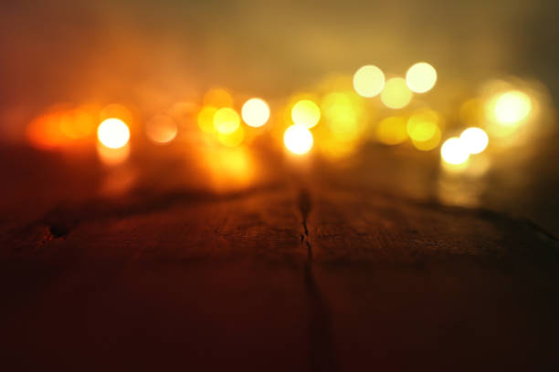 istock background image of abstract blurred gold garland lights. defocused 1184561290