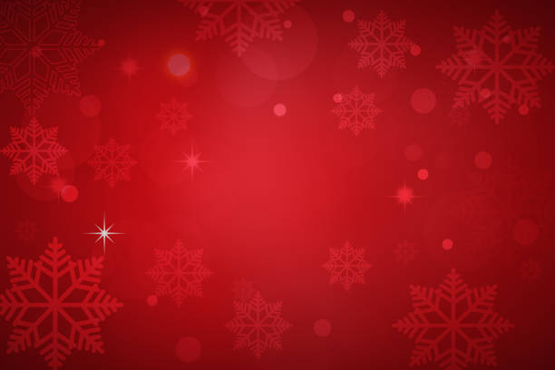 istock snowflakes background with Snowflakes and snowfall on a cold  winter background 1184562406