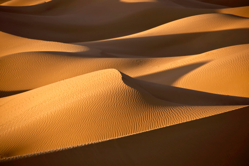 Desert dunes at sunset with scenic view