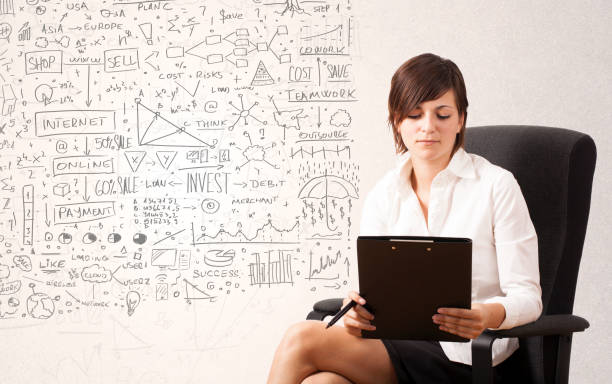 istock Young woman sketching and calculating thoughts 1184566121