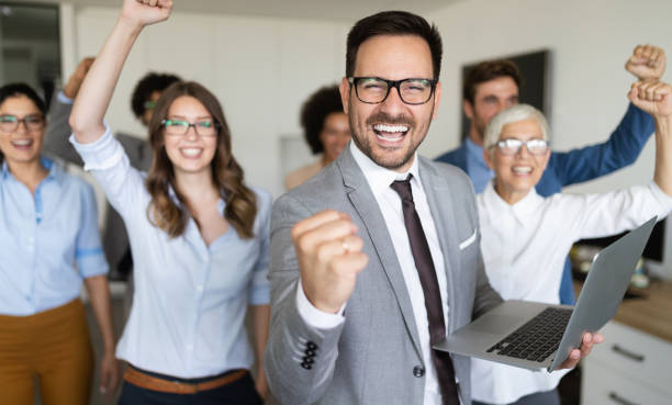 istock Successful business group of people at work in office 1184566163