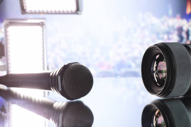 istock The microphone on the stage in front of the hall. Performance on stage. 1184566395