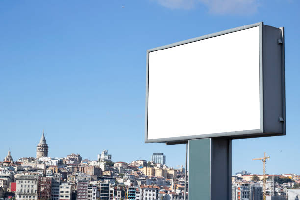 istock Advertising sign close-up. There is a galata tower and city view in the back. 1184569708
