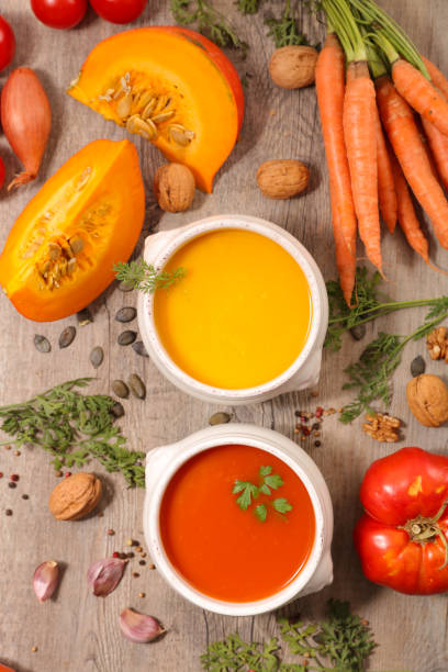 istock tomato and carrot soup, top view 1184570203