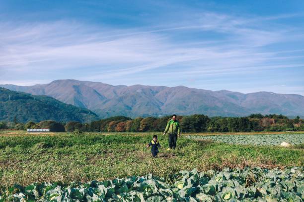 Japanese farmers family father and son in Nagano, Japan