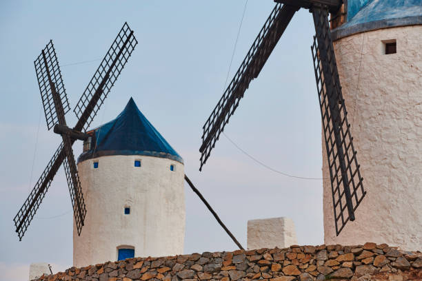 istock Traditional antique windmills at sunset in Spain. Consuegra, Toledo 1184574409