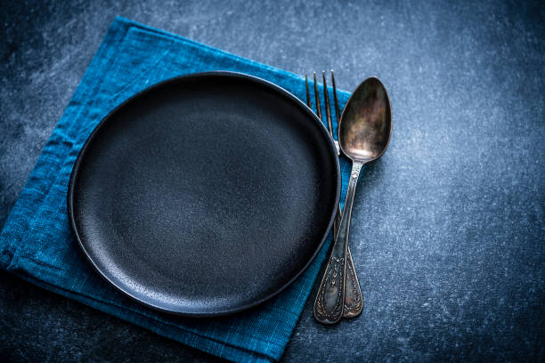 istock Blue and black place setting shot from above with copy space 1184577887