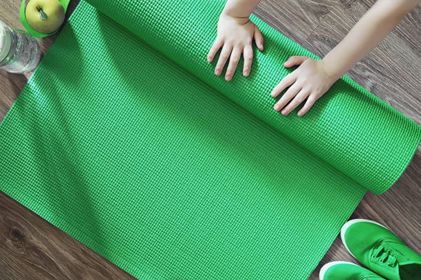 istock Mat for practicing yoga on the floor. Healthy lifestyle. 1184577983