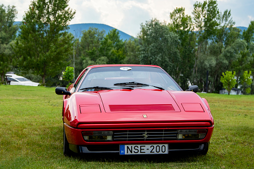 Hungary Szodliget Jun 22, 2019: A red vintage Ferrari on display in a mint condition.