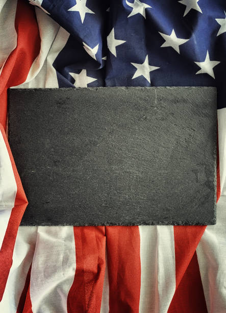 istock American flag on a black background. Space for text. 1184581475