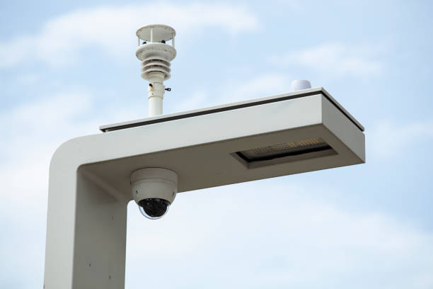 istock cctv camera Monitoring lamp post 1184585323