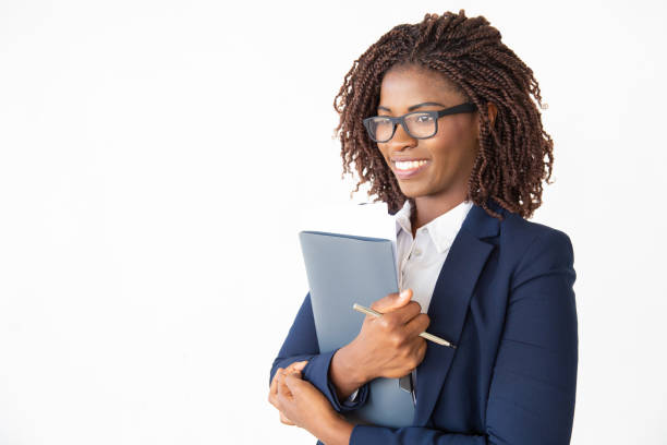 istock Happy cheerful office assistant in glasses holding documents 1184585830