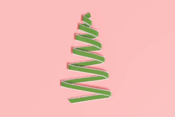 istock Green Ribbon Christmas Day decoration objects shape by Christmas tree on pink background. Minimal idea concept. 3D Rendering. 1184587184