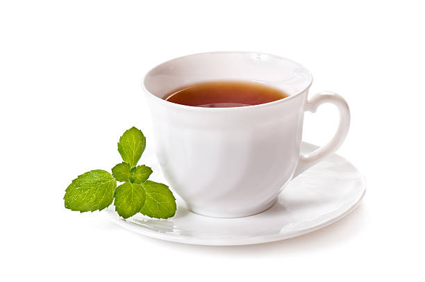 istock A hot cup of tea with mint on a saucer 118458776