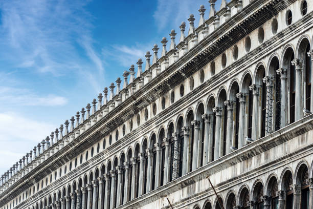 Venice, Procuratie Vecchie, closeup of the ancient buildings in Piazza San Marco, the square in historic center. UNESCO world heritage site, Veneto, Italy, Europe