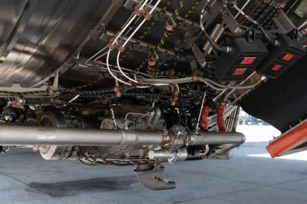 istock Gas turbine engine during repair by technician. 1184589304