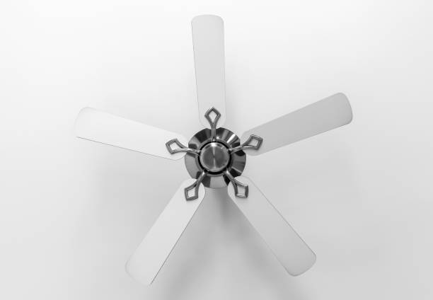 White ceiling fan close-up photo soft light gray shadow