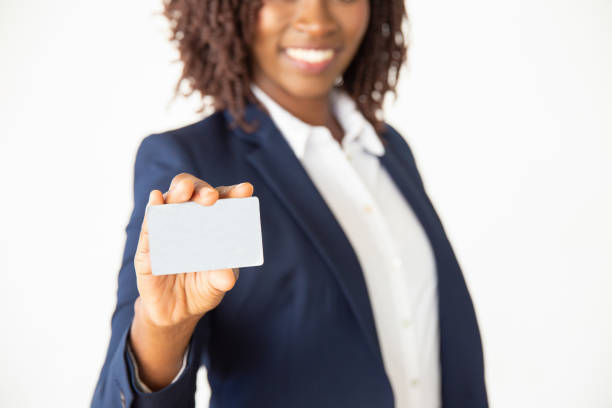 istock Successful bank representative advertising credit card 1184592156