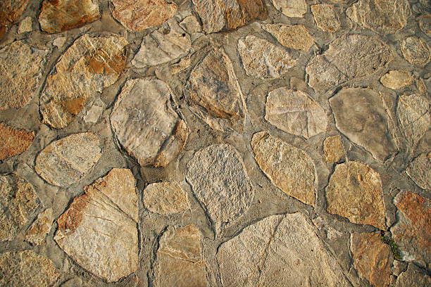 Grunge natural stone wall textured background stock photo