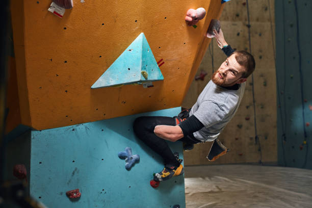istock Athletic young male mountaineer trains hard despite his physical disability 1184596128