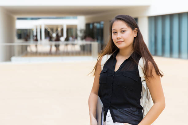 istock Cheerful female colleague student 1184597046