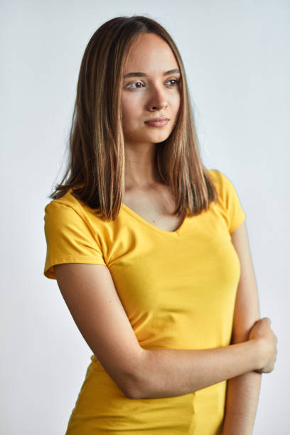 istock girl touching her elbow, thinking about effective ways to remove pigment spots quickly 1184600457