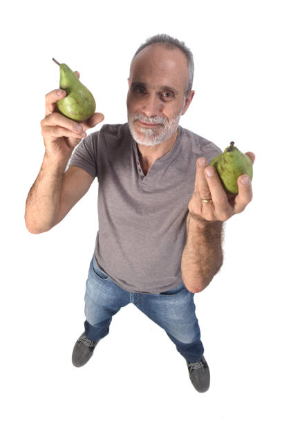 man with fruit on white background