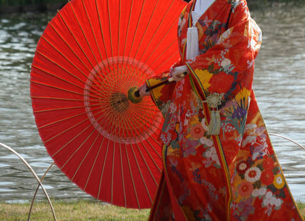 Red twelve-layered ceremonial kimono (Japanese national costume). Shooting Location: Yokohama-city kanagawa prefecture