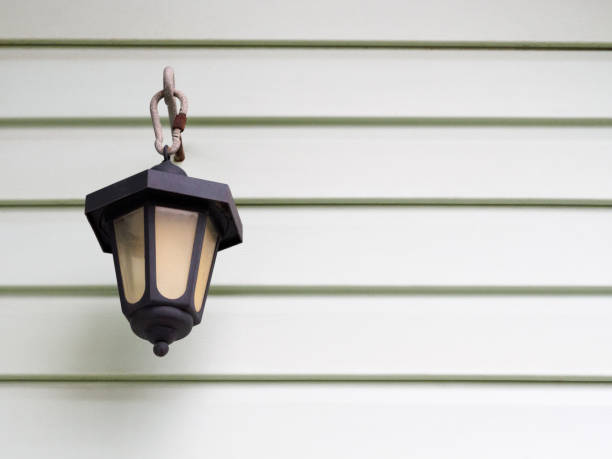 istock Street lamp on a background of light green plastic battens 1184604301