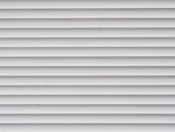 istock Background of horizontal white metal stripes 1184605487
