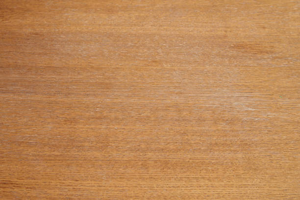 istock Textured wooden table in close up view from above 1184605549