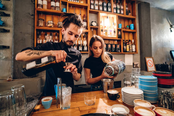 barista making coffee cocktail - pouring coffee liquid coffee bean imagens e fotografias de stock