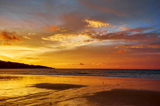 istock Tropical beach at beautiful sunset. Nature background 1184609543