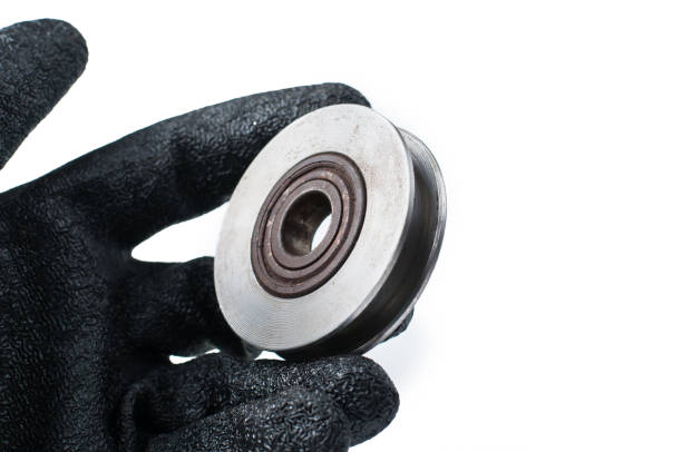 istock Small steel pulley isolated on white background.Copy space 1184612053