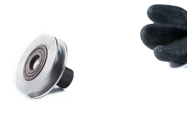 istock Small steel pulley isolated on white background.Copy space 1184612265