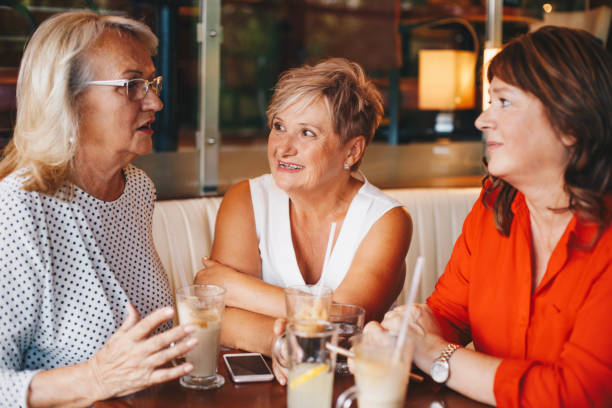 istock Lifelong friends catching up over coffee 1184616183