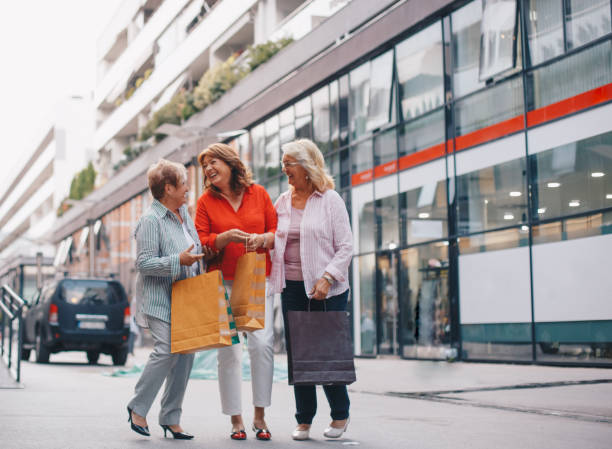 istock Three senior women out shopping 1184616398