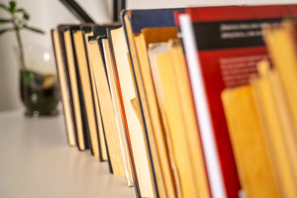 istock Shelf with books, close-up 1184617054